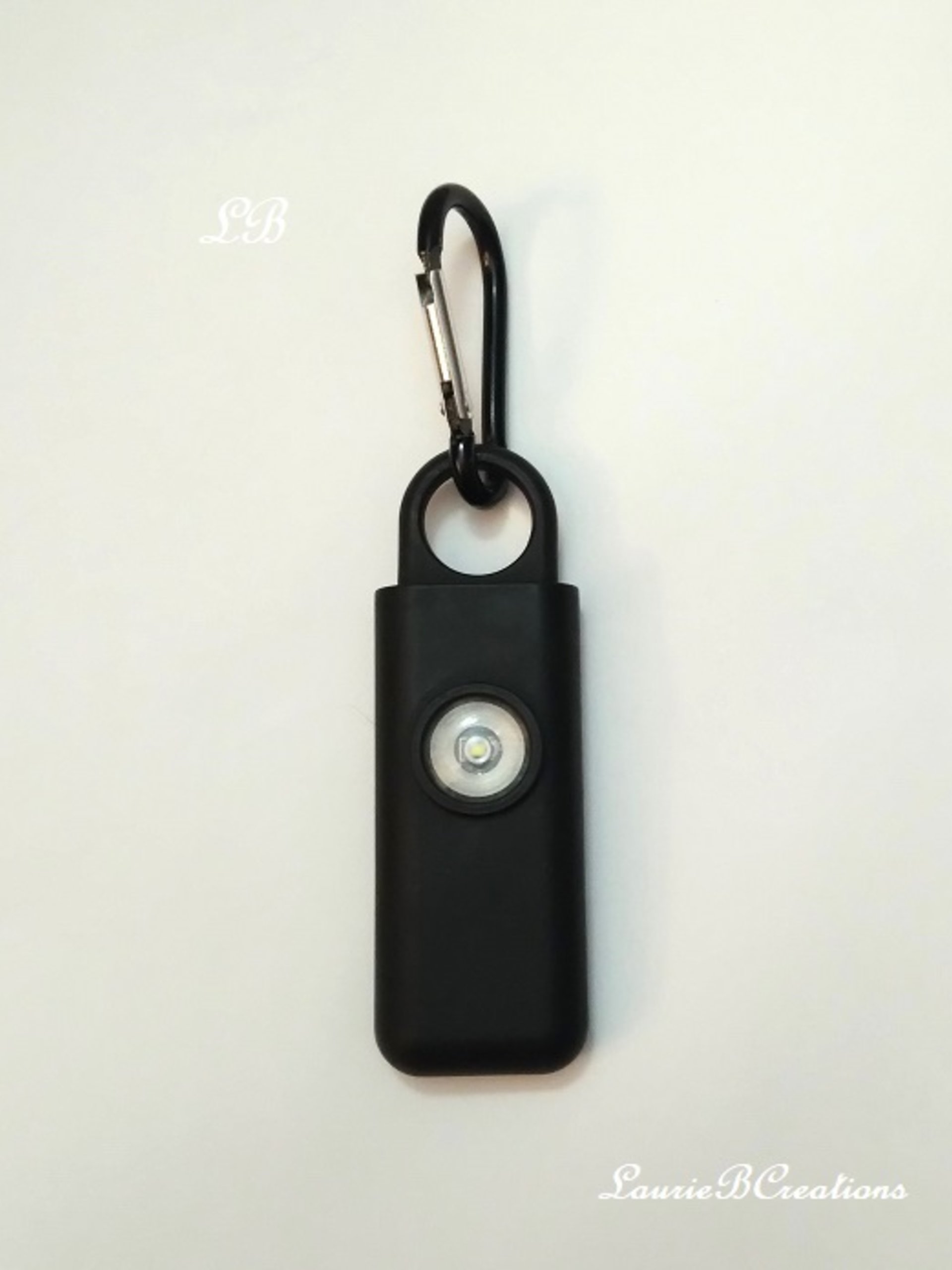 Personal Alarm Keychain 130 decibel with strobe light - black, light pink, or light blue